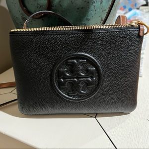 Black Tory Burch Crossbody with brown straps w/zipper pockets